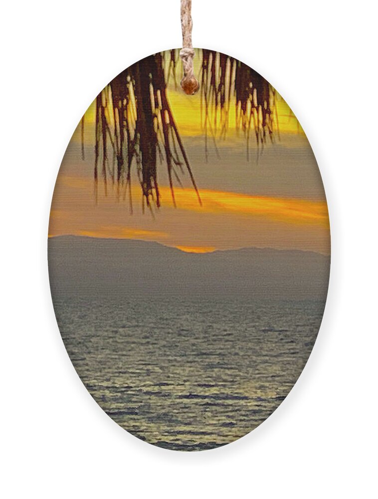 Canada Ornament featuring the photograph Boating at Sunset by Mary Mikawoz