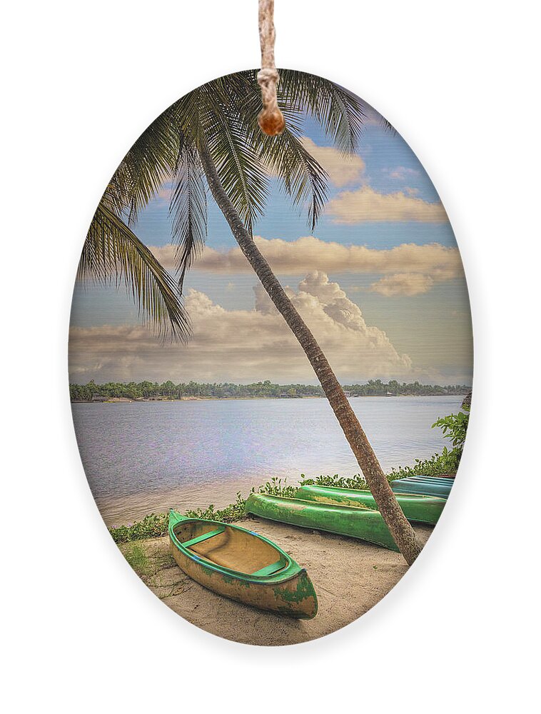 African Ornament featuring the photograph Canoes Waiting on the Beach by Debra and Dave Vanderlaan