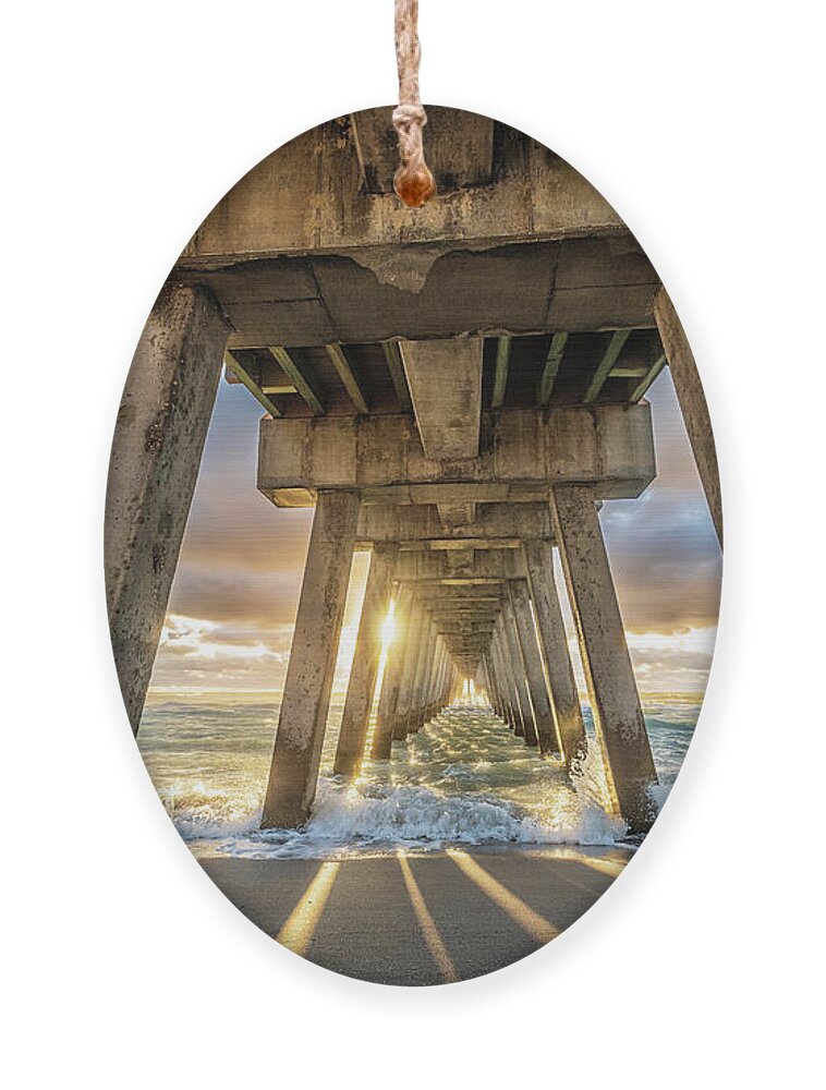 Venice Fishing Pier Ornament featuring the photograph Chasing the light under the Pier by Rudy Wilms