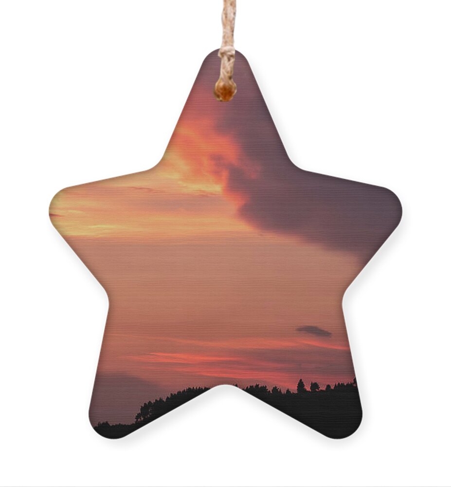 Orange Sunset Ornament featuring the photograph Colorful Sunset over Tree Silhouettes by Alexios Ntounas