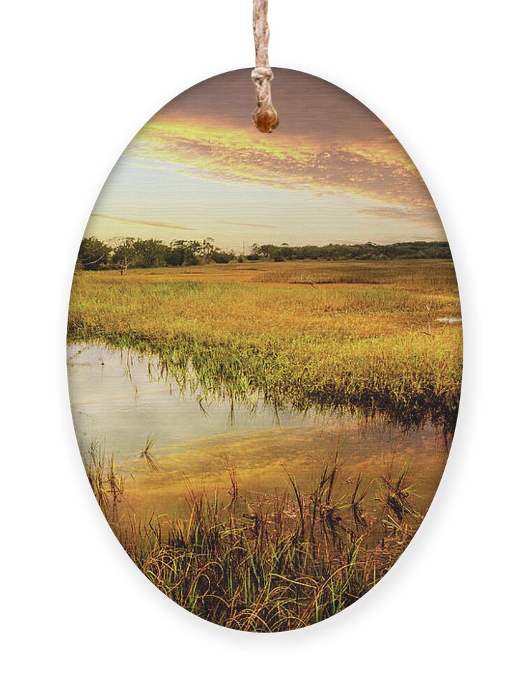 Clouds Ornament featuring the photograph Colors over the Marsh by Debra and Dave Vanderlaan