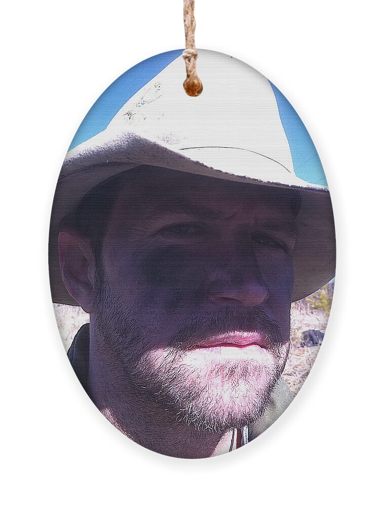 Cowboy Ornament featuring the photograph Cowboy by Lee Darnell