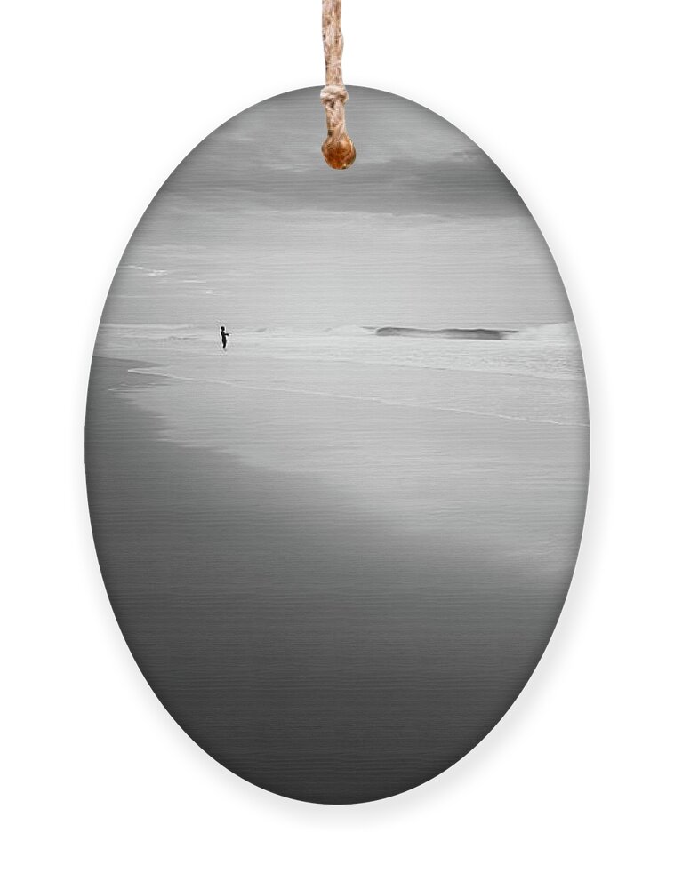 Beach Ornament featuring the photograph Distant Fisherman by Jordan Hill