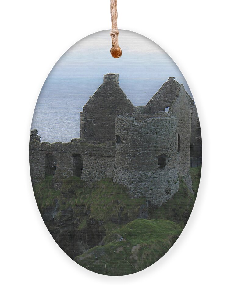Dunluce Castle Ornament featuring the photograph Dunluce Castle Northern Ireland by Veronica Batterson