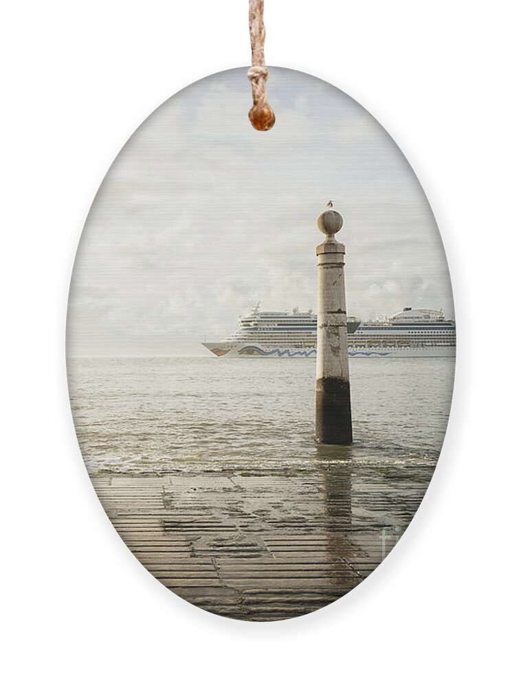 Embankment Ornament featuring the photograph Embankment of Lisbon by Anastasy Yarmolovich