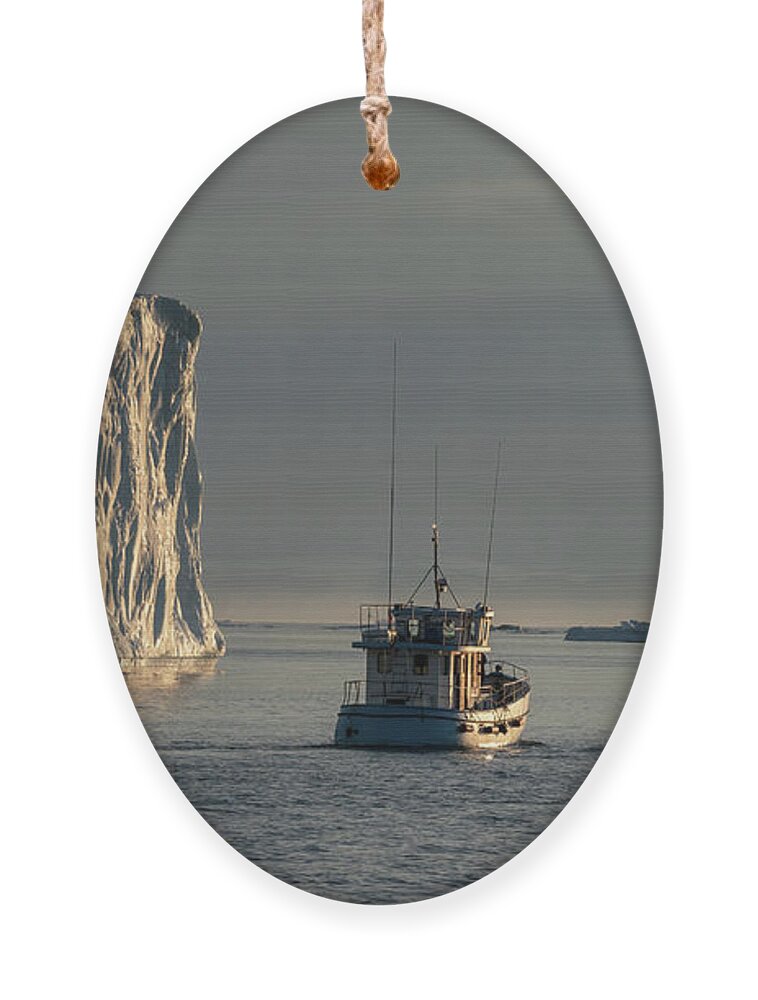 Disco Bay Ornament featuring the photograph Fishing boat in Disco bay by Anges Van der Logt