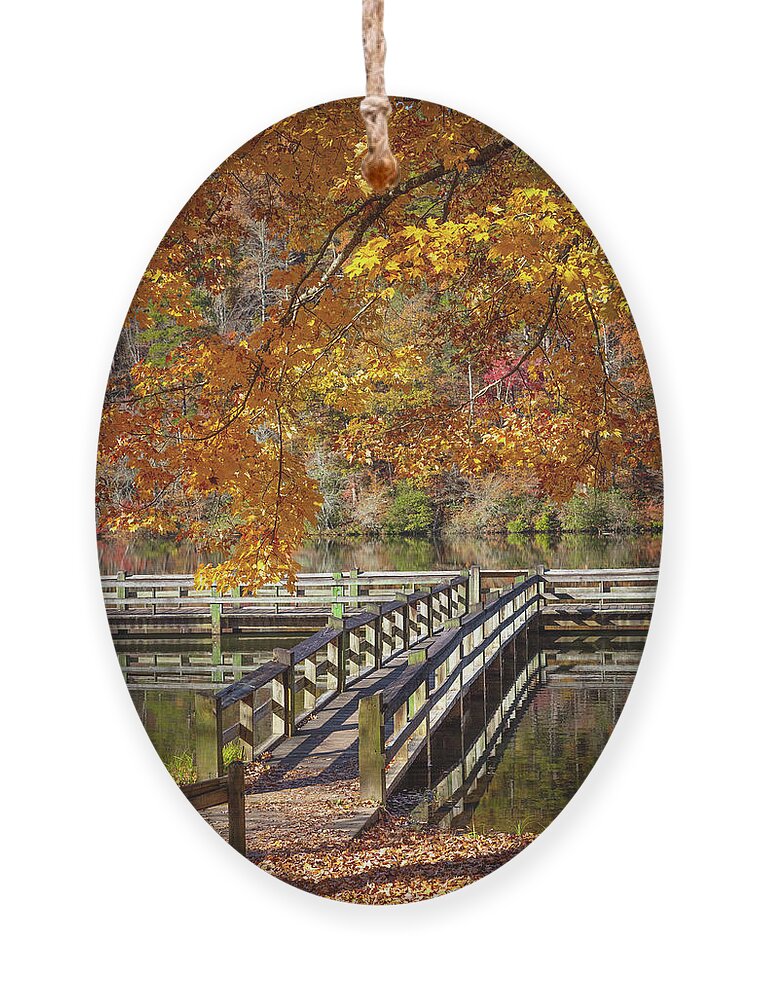Carolina Ornament featuring the photograph Fishing Dock under the Maple Trees by Debra and Dave Vanderlaan