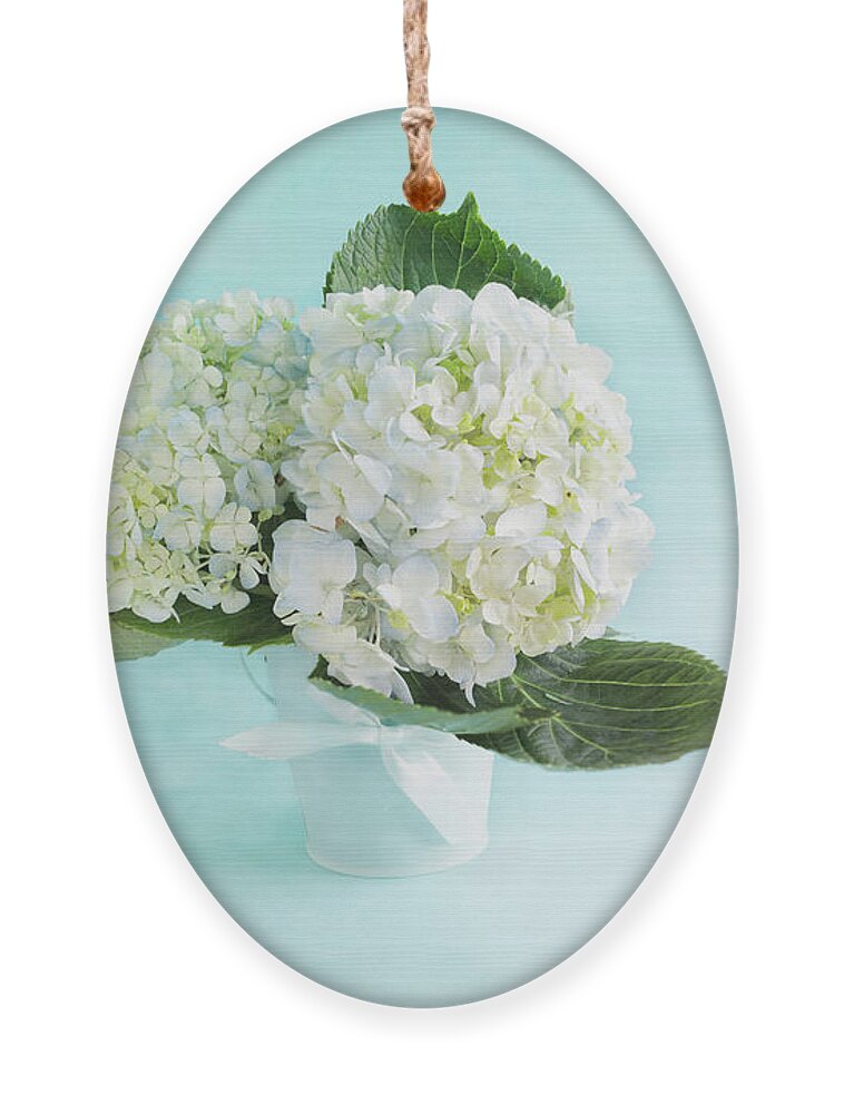 Flower Arrangement Ornament featuring the photograph Flower arrangement bouquet of three large white and blue hydrang by Stephanie Frey