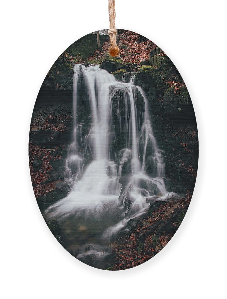 Splash Ornament featuring the photograph Frosty waterfall Tosanovsky in Czech republic by Vaclav Sonnek