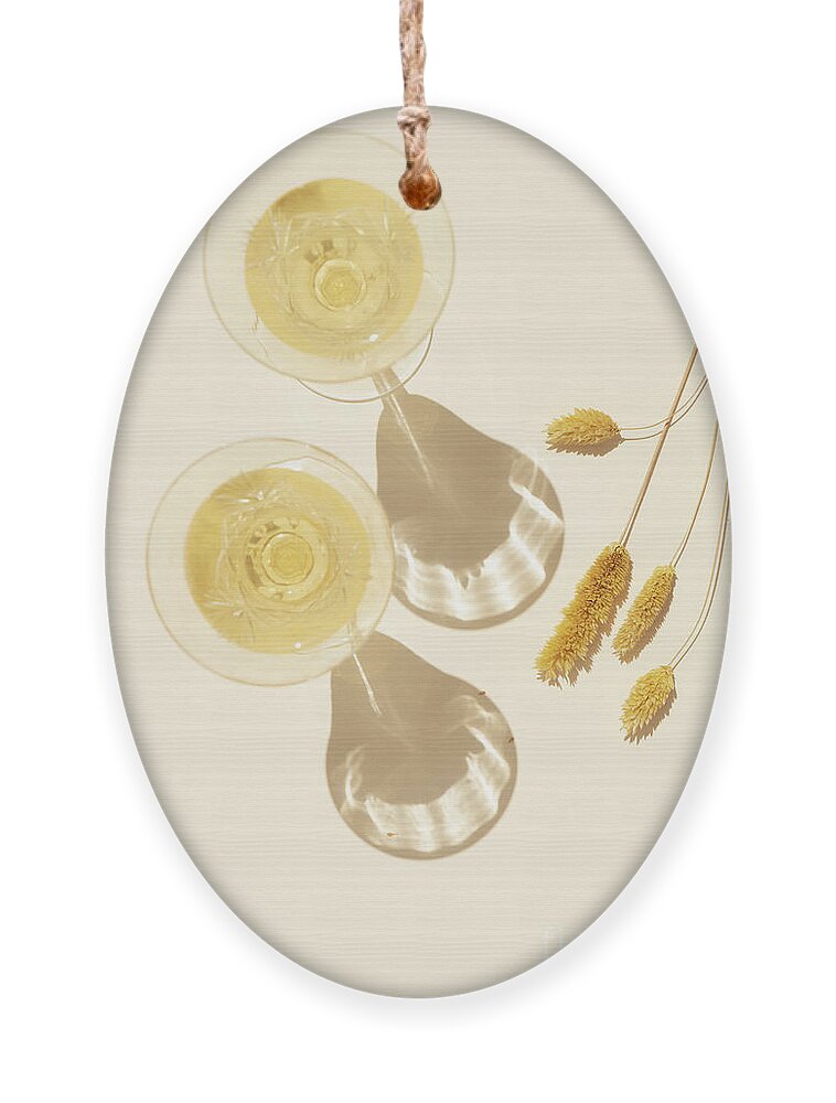 Glass Ornament featuring the photograph Golden Champagne II by Anastasy Yarmolovich