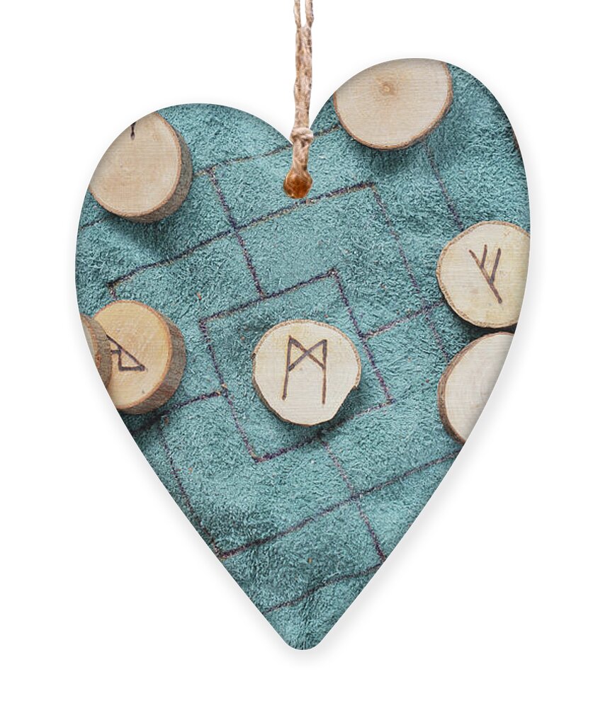 Runes Ornament featuring the photograph Handmade runes for fortunetelling by Anastasy Yarmolovich