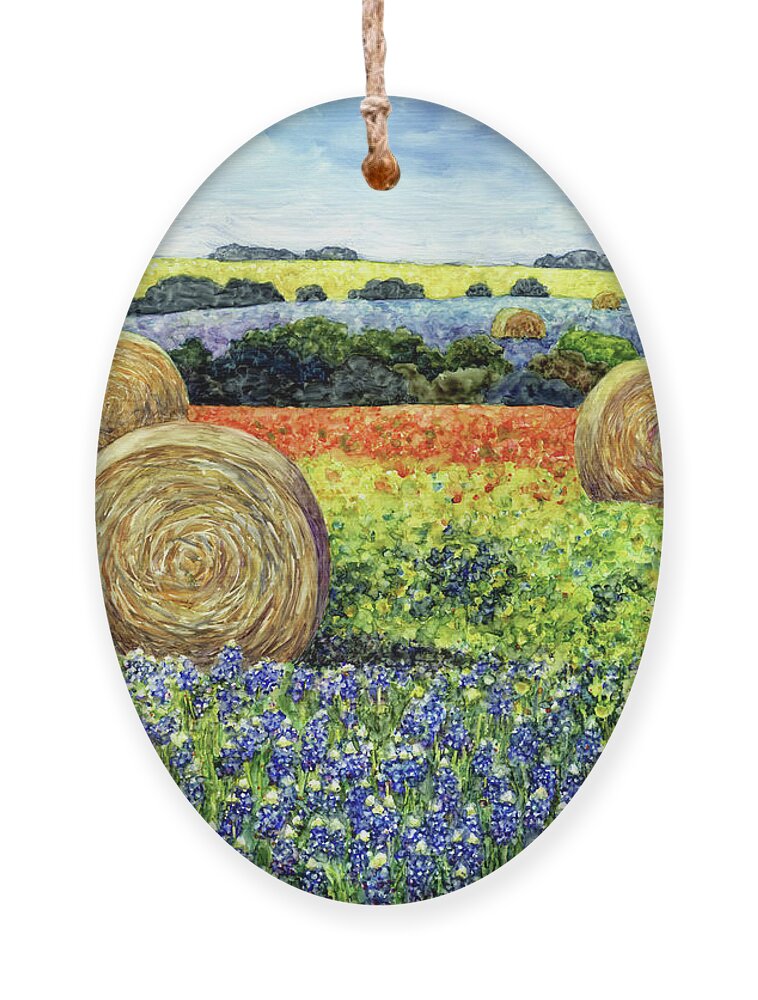 Bluebonnet Ornament featuring the painting Hay bales and Wildflowers by Hailey E Herrera