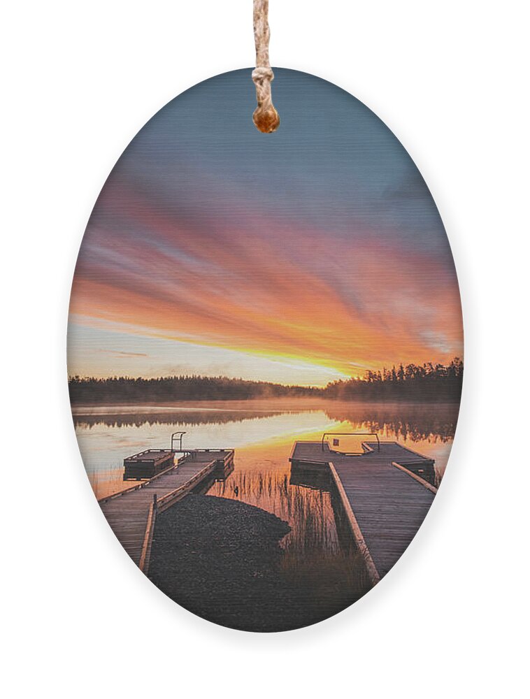 Lake Jatkonjärvi Ornament featuring the photograph Hell on a Finnish lake by Vaclav Sonnek