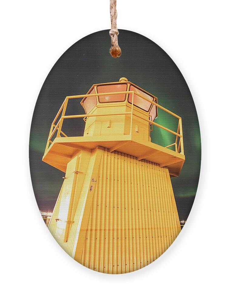 Höfði Ornament featuring the photograph Hofoi lighthouse Northern Lights on the Reykjavik Waterfront Iceland Streak by Toby McGuire