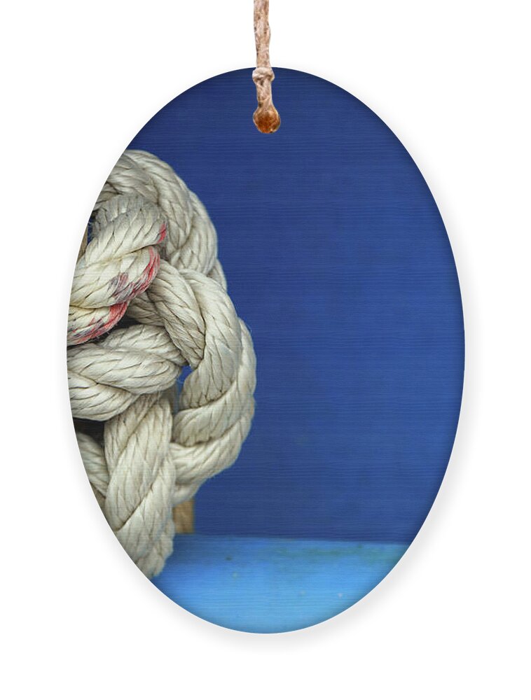 Rope Ornament featuring the photograph Knot on a rope by Fabiano Di Paolo