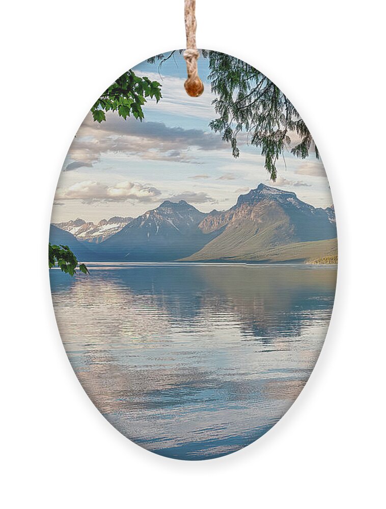Lakes And Rivers Ornament featuring the photograph Lake McDonald by Larey McDaniel