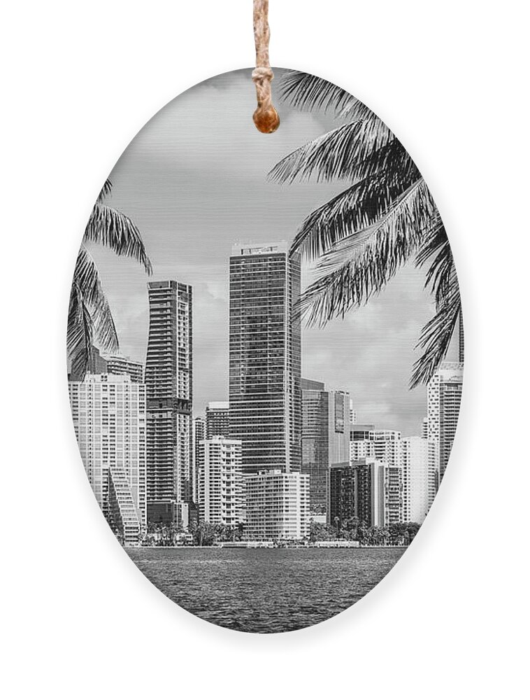 2022 Ornament featuring the photograph Miami Florida Skyline and Palm Trees Black and White Picture by Paul Velgos