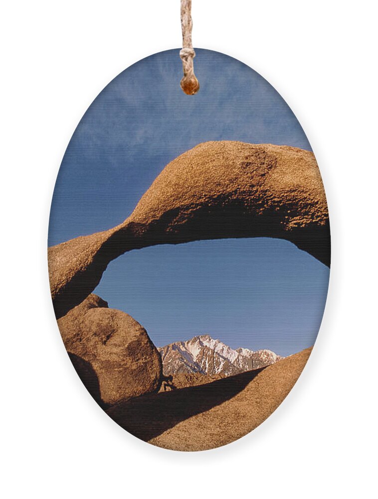 Dave Welling Ornament featuring the photograph Mobius Arch Alabama Hills California by Dave Welling