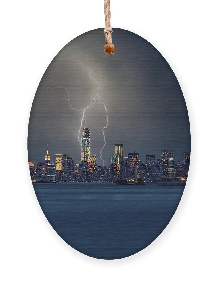 New York City Skyline Ornament featuring the photograph New York Is Electric by Jonathan Davison