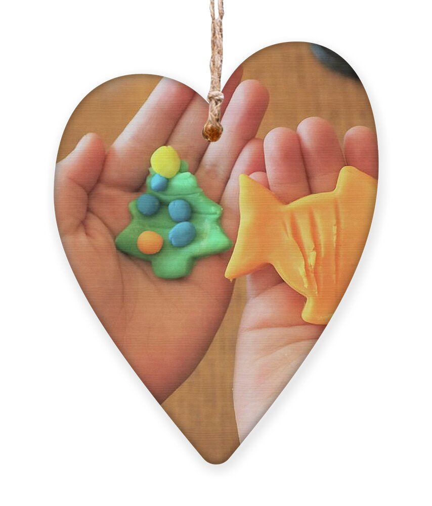 Yellow Ornament featuring the photograph Offering Hands by C Winslow Shafer