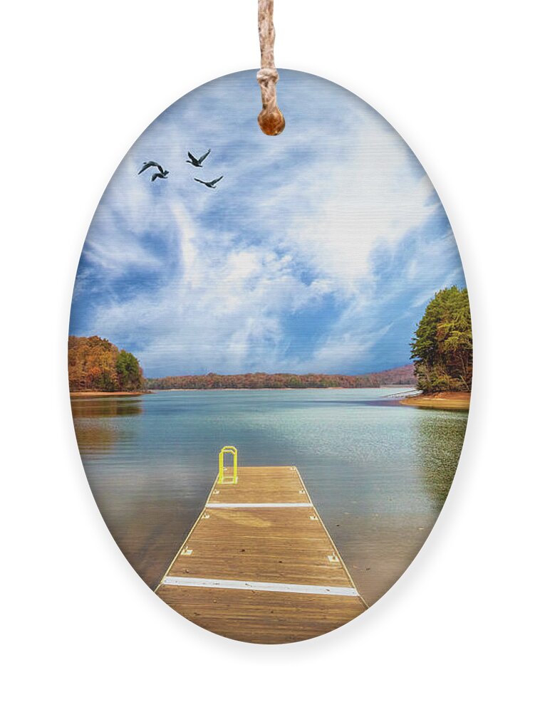 Pier Ornament featuring the photograph Red Canoe at the Lake Dock by Debra and Dave Vanderlaan