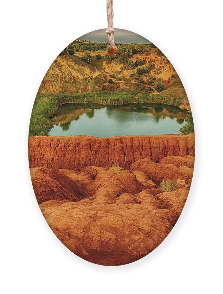 Italy Ornament featuring the photograph Red Soils Around The Lake In Bauxite Quarry by Vivida Photo PC