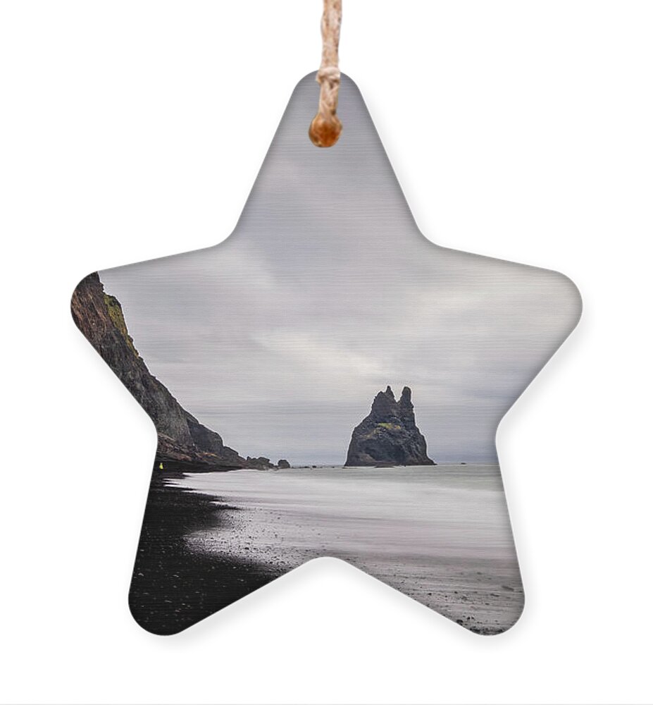 Reynisfjara Ornament featuring the photograph Reynisfjara black sand beach in Iceland by Alexios Ntounas