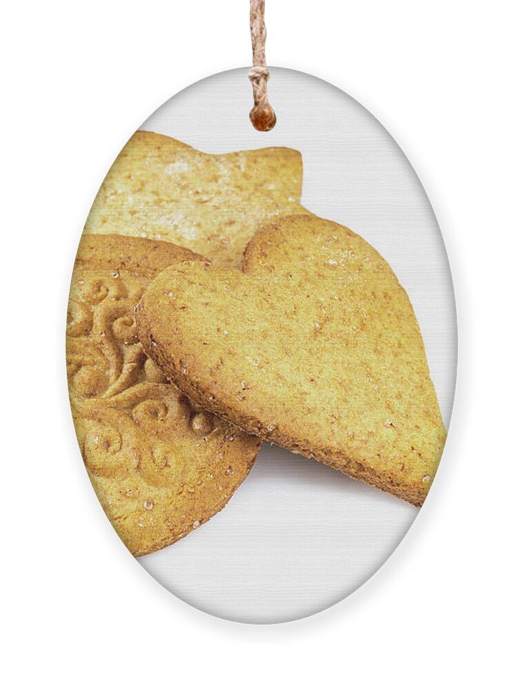 Gingerbread Ornament featuring the photograph Round, heart and star shaped gingerbread by Viktor Wallon-Hars