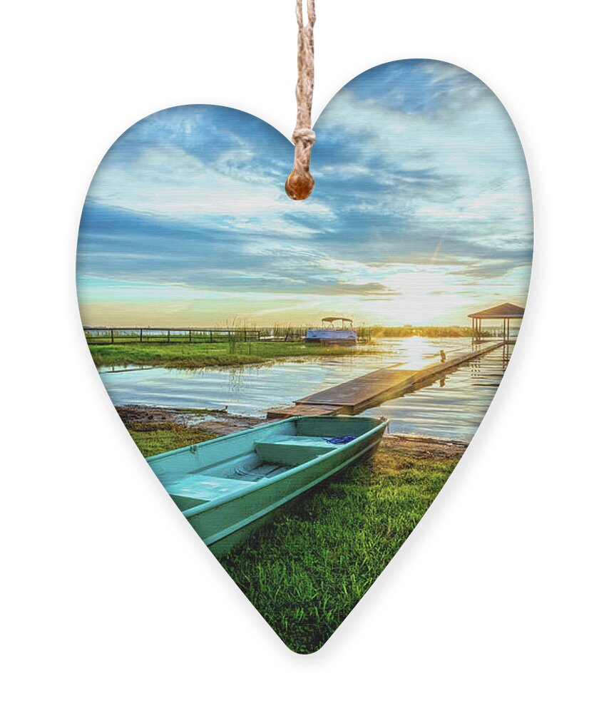 Docks Ornament featuring the photograph Rowboat at the Water's Edge by Debra and Dave Vanderlaan