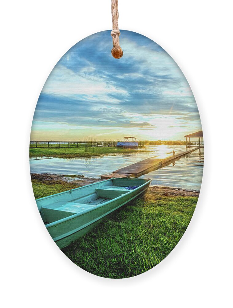 Docks Ornament featuring the photograph Rowboat at the Water's Edge by Debra and Dave Vanderlaan