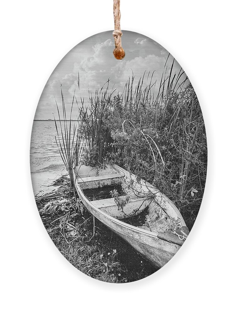 Boats Ornament featuring the photograph Rowboat in the Marsh in Black and White by Debra and Dave Vanderlaan