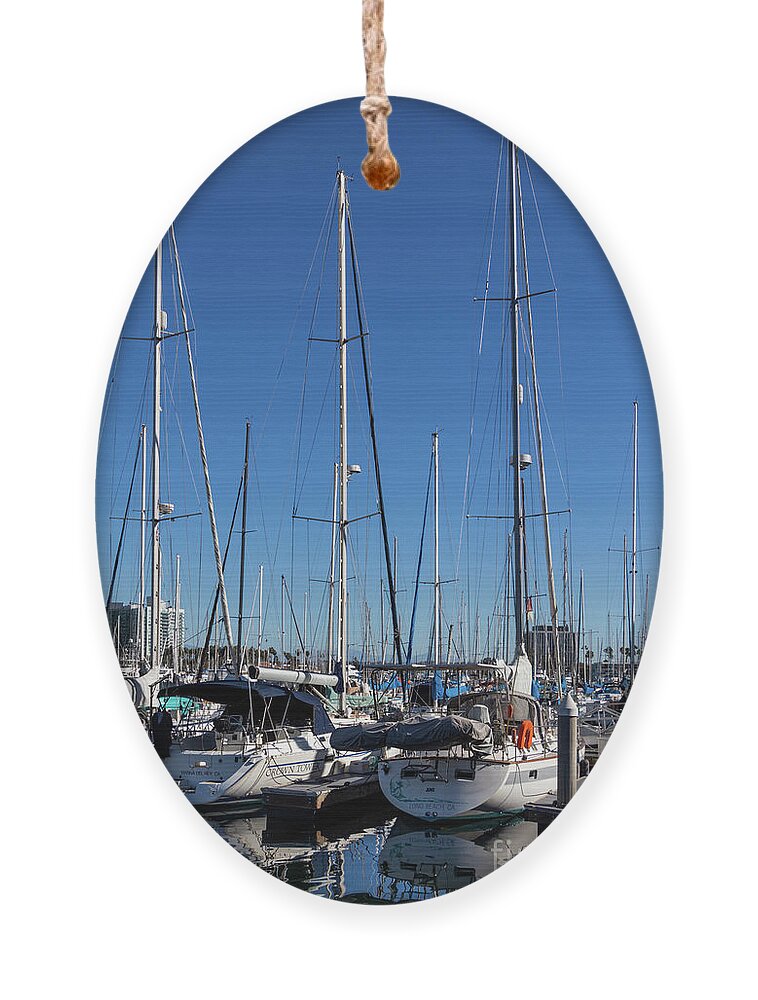 Sailboats Ornament featuring the photograph Sailboats with Reflections in Blue Water by Roslyn Wilkins