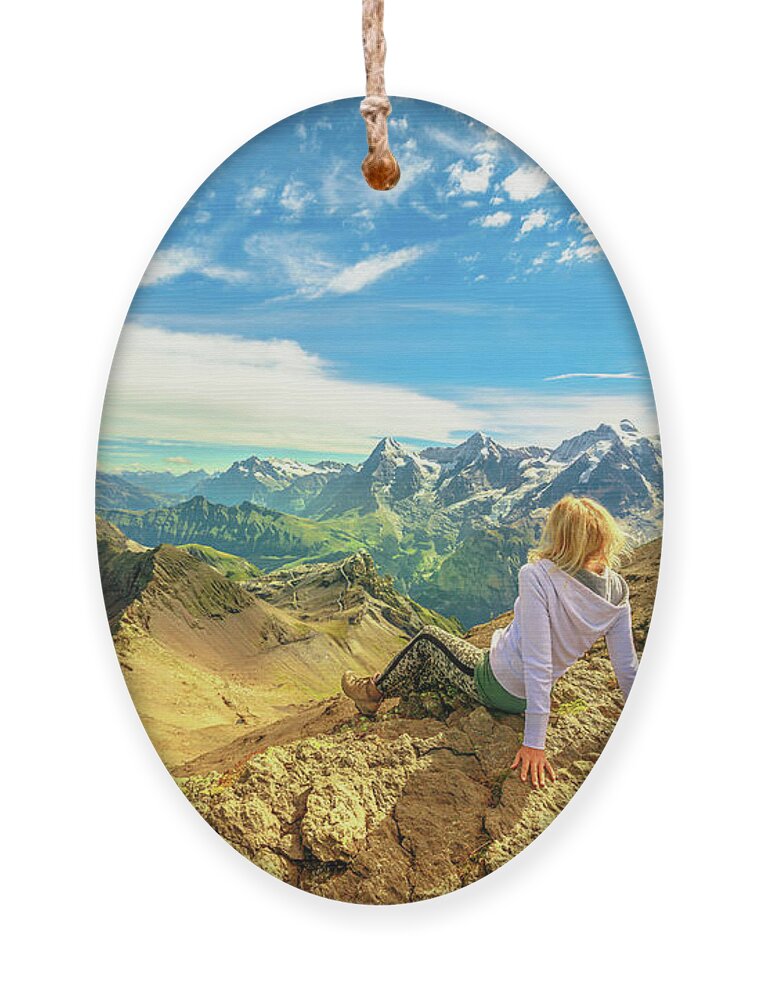 Schilthorn Ornament featuring the photograph Schilthorn Peaks Switzerland woman by Benny Marty