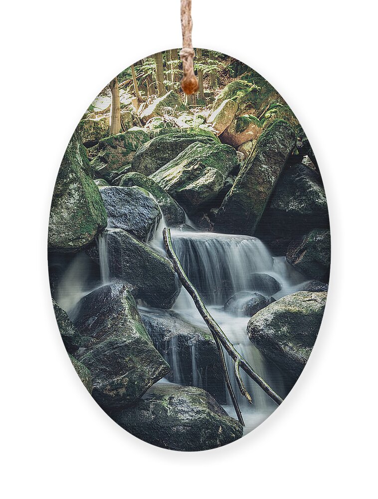 Jizera Mountains Ornament featuring the photograph Water flowing over rocks in icy morning weather by Vaclav Sonnek