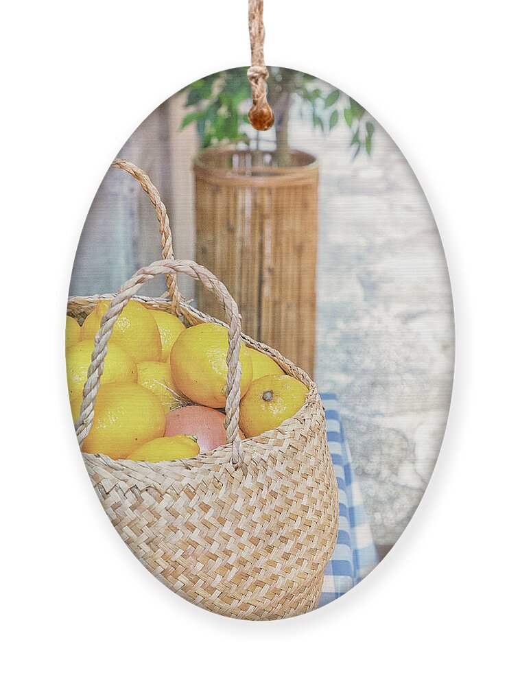 Lemons Ornament featuring the photograph Spanish Lemons by Becqi Sherman