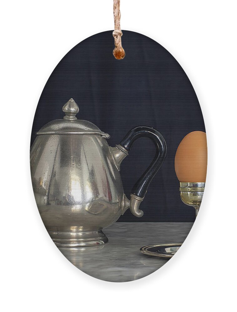 Patina Ornament featuring the photograph Sterling Silver Eggcup and Teapot Black Background Still Life by Pablo Avanzini
