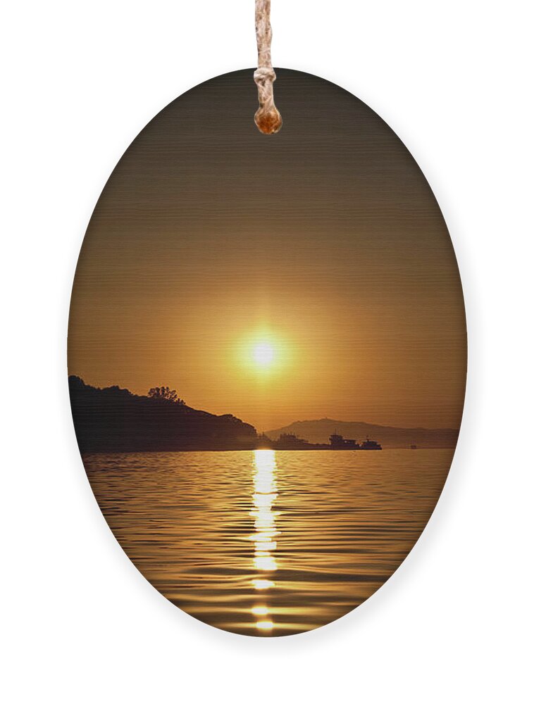 Birman Ornament featuring the photograph Sunset at Inle Lake, Myanmar by Lie Yim