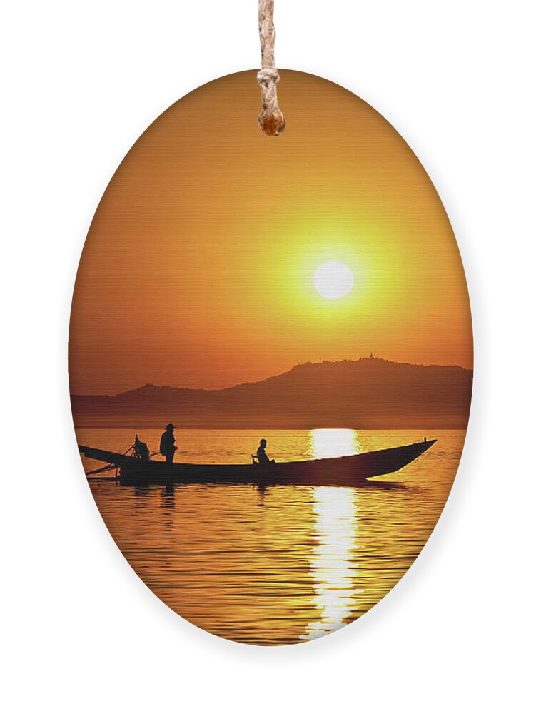 Birman Ornament featuring the photograph Sunset boat ride on Inle Lake by Lie Yim