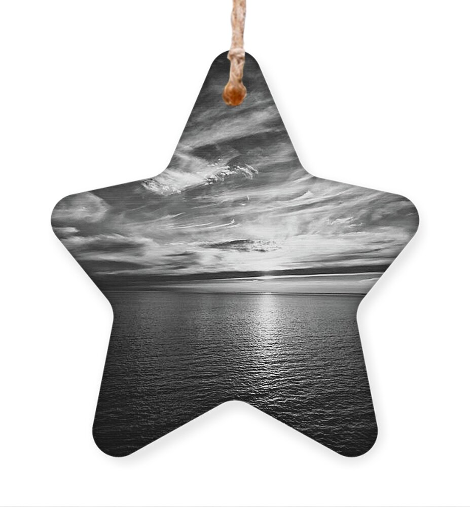 Sunset Ornament featuring the photograph Sunset on the horizon at sea by Bernhard Schaffer