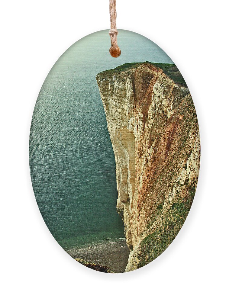 Cliffs At Deauville Ornament featuring the photograph The Cliffs at Deauville by Susan Maxwell Schmidt