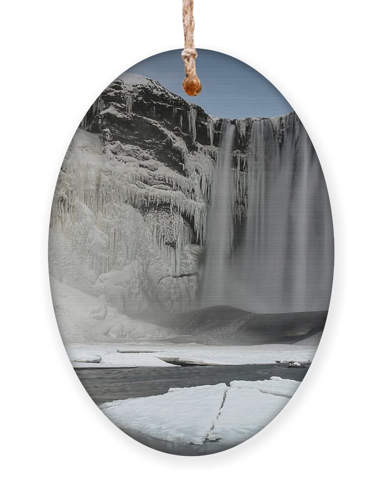 Skogafoss Ornament featuring the photograph Waterfall Skogafoss in Iceland by Marjolein Van Middelkoop