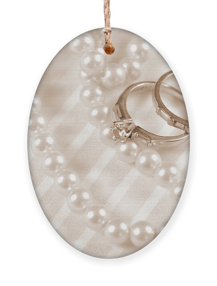 Card Ornament featuring the photograph Wedding and diamond engagement rings with pearl necklace by Milleflore Images