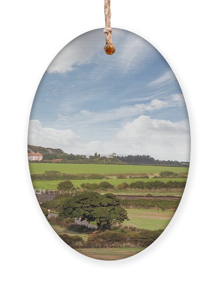 Weybourne Ornament featuring the photograph Weybourne windmill in Norfolk England by Simon Bratt