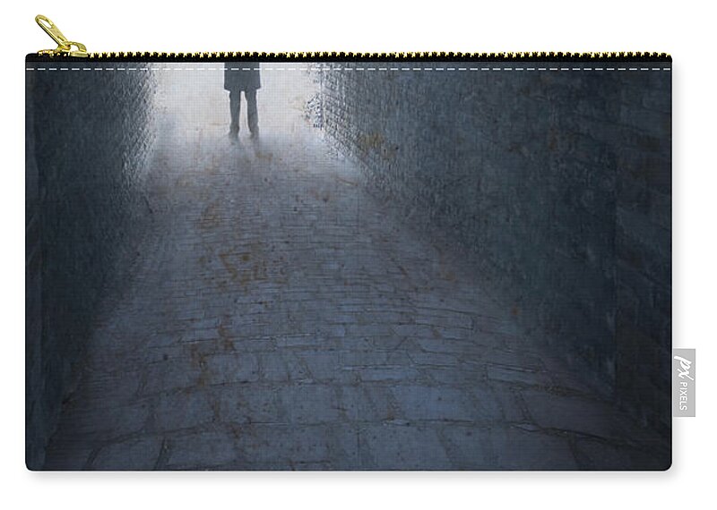 Man Zip Pouch featuring the photograph Victorian Or Edwardian Man With Top Hat Standing At The End Of by Lee Avison
