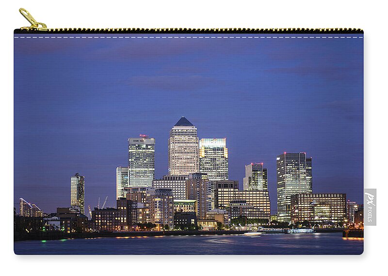 Canary Wharf Zip Pouch featuring the photograph Canary Wharf At Twilight, London, U.k #1 by John Harper