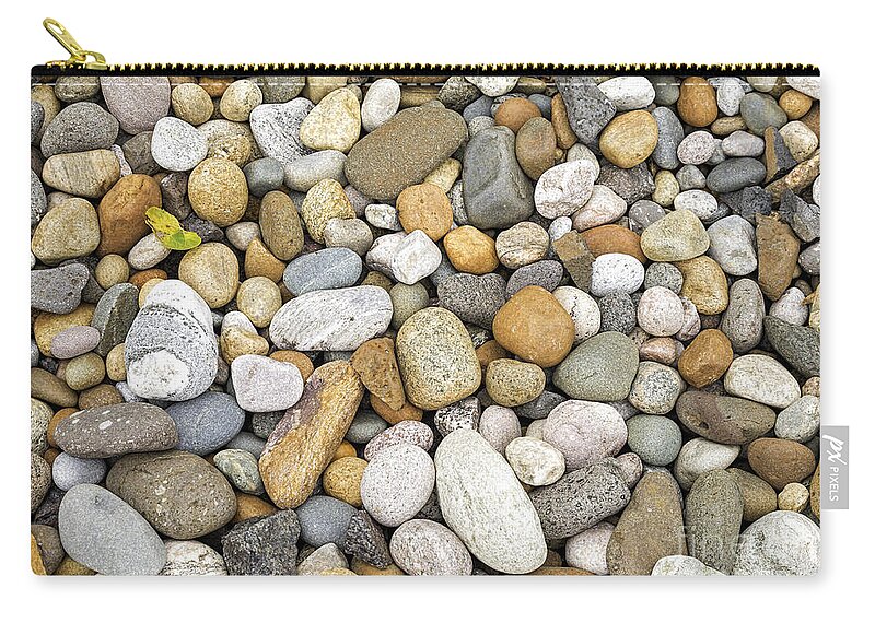 Pebbles Zip Pouch featuring the photograph Colorful pebbles #1 by Les Palenik