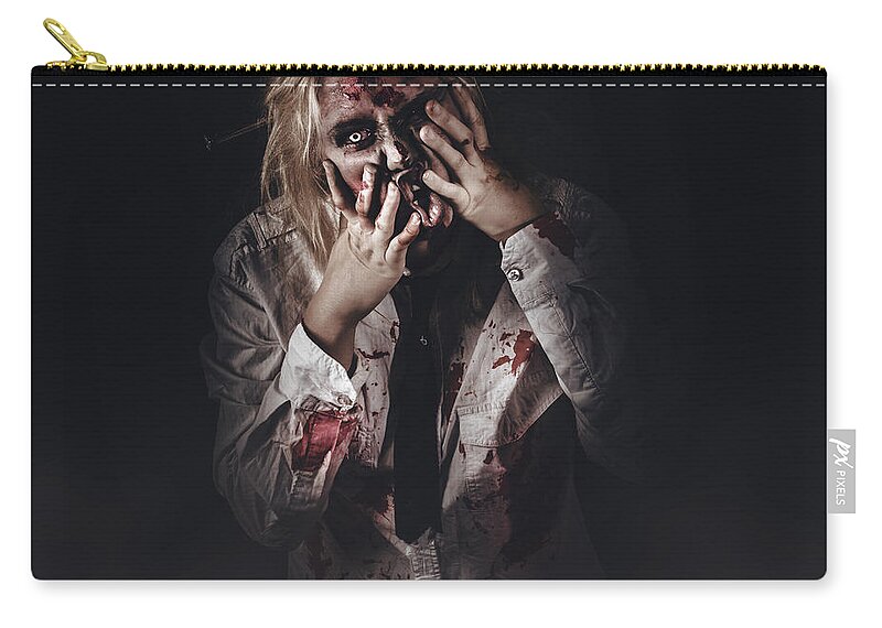 Zombie Zip Pouch featuring the photograph Dark halloween portrait. Scary evil zombie #1 by Jorgo Photography