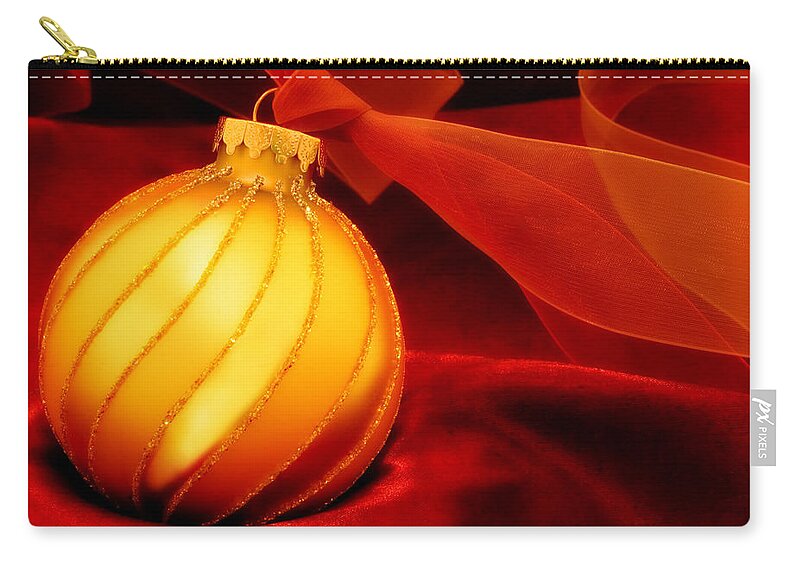 Christmas Zip Pouch featuring the photograph Golden Ornament with Red Ribbons #2 by Carol Leigh