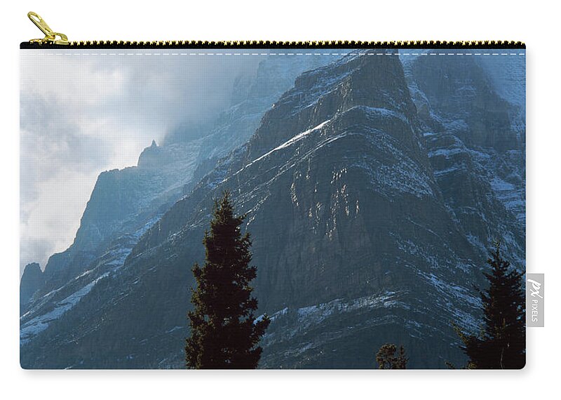 Cloudy Zip Pouch featuring the photograph Gunsight Mountain #1 by Tracy Knauer