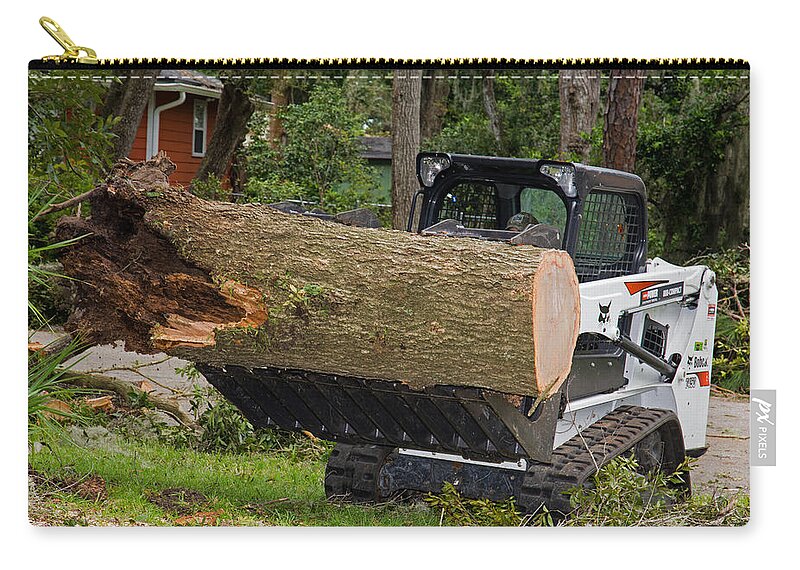 Bobcat Tractor Zip Pouch featuring the photograph Hurricane Irma Damage, Bobcat Tractor #1 by Millard H. Sharp